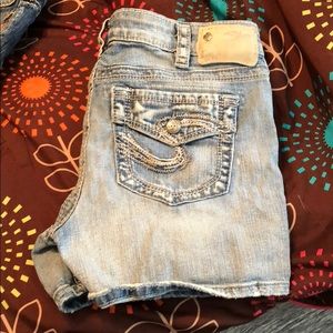 Silver brand shorts.